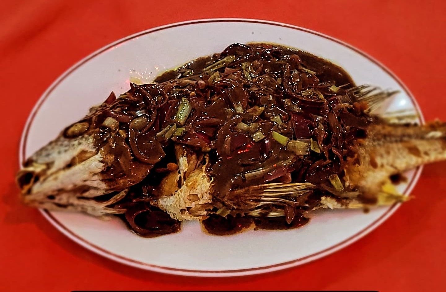 Whole fried fish in black bean sauce