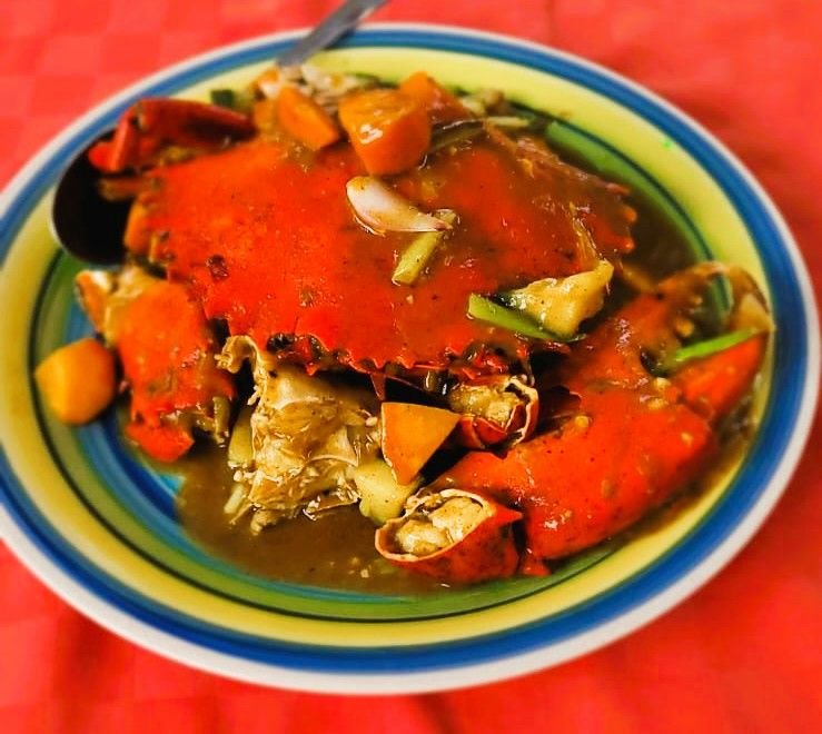 Whole crab in rich curry sauce